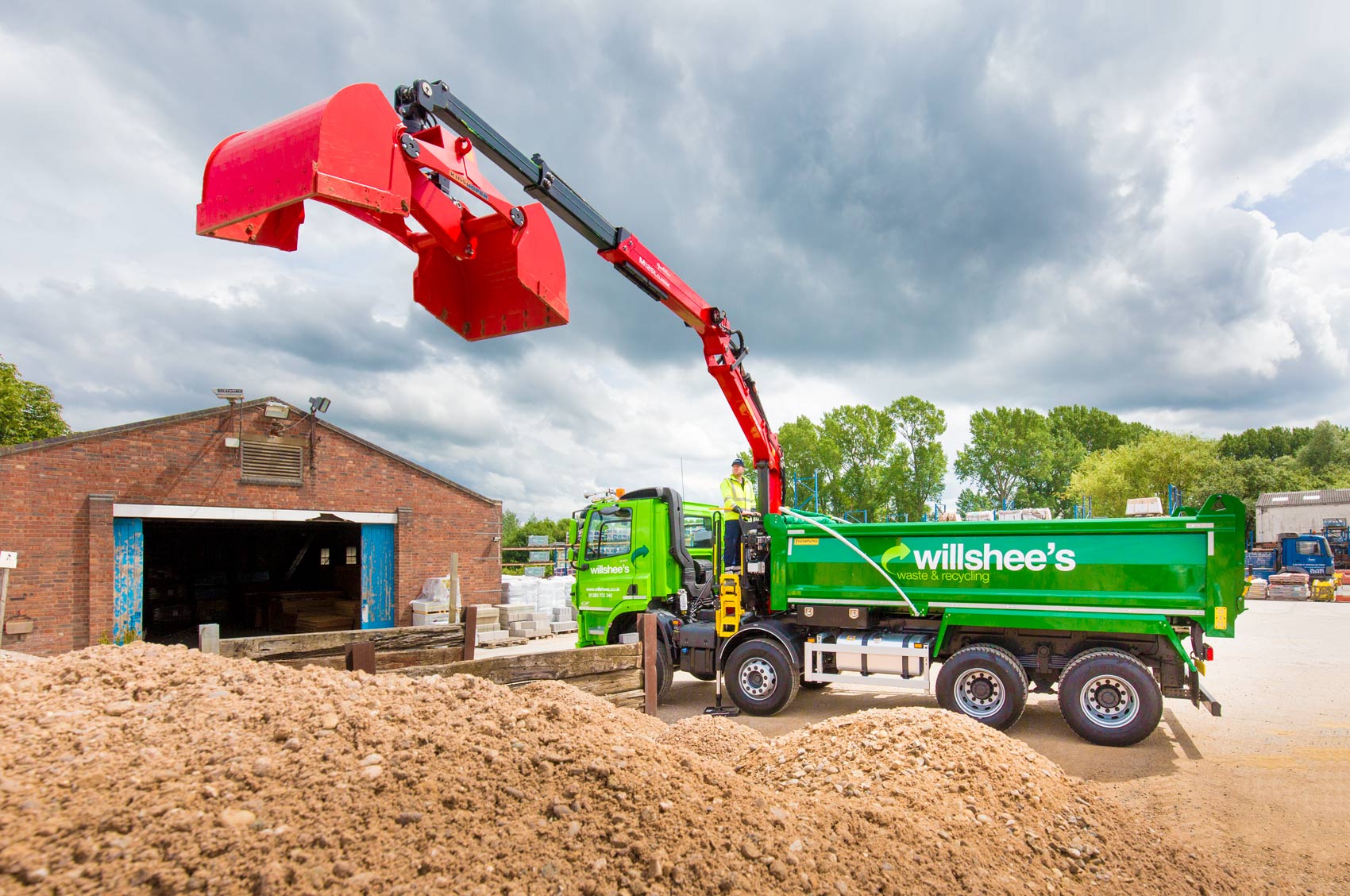 Advertising Photography of a grab truck about to load with gravel