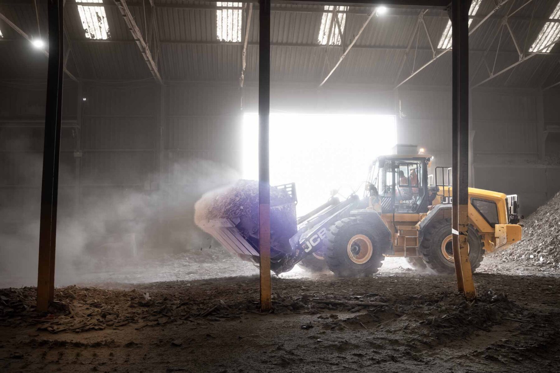 Wheeled-loader-in-Dusty-processing-wharehouse.jpg